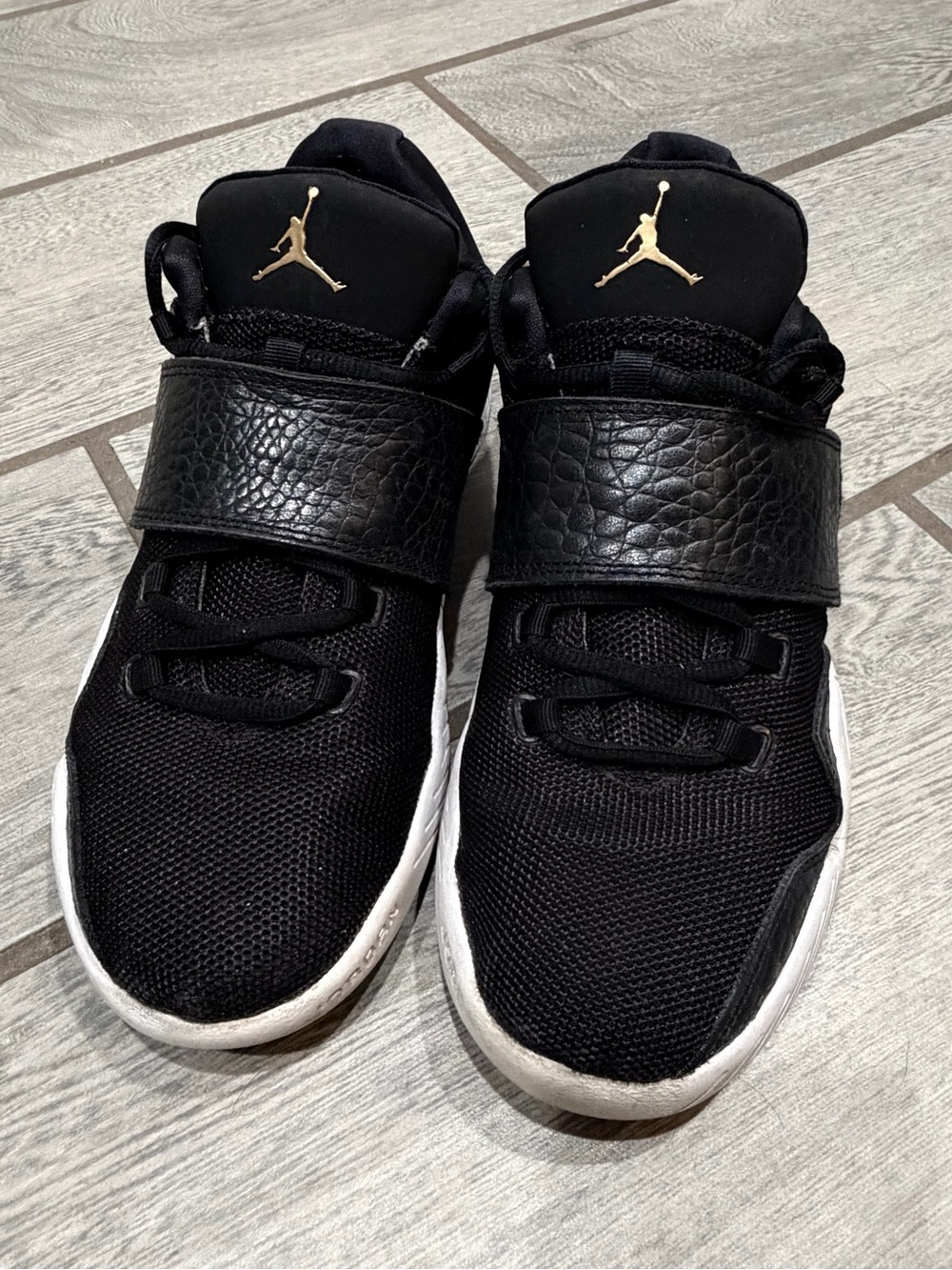 Jordan Boys' Black and White High-Top Basketball Sneakers with Gold Jumpman